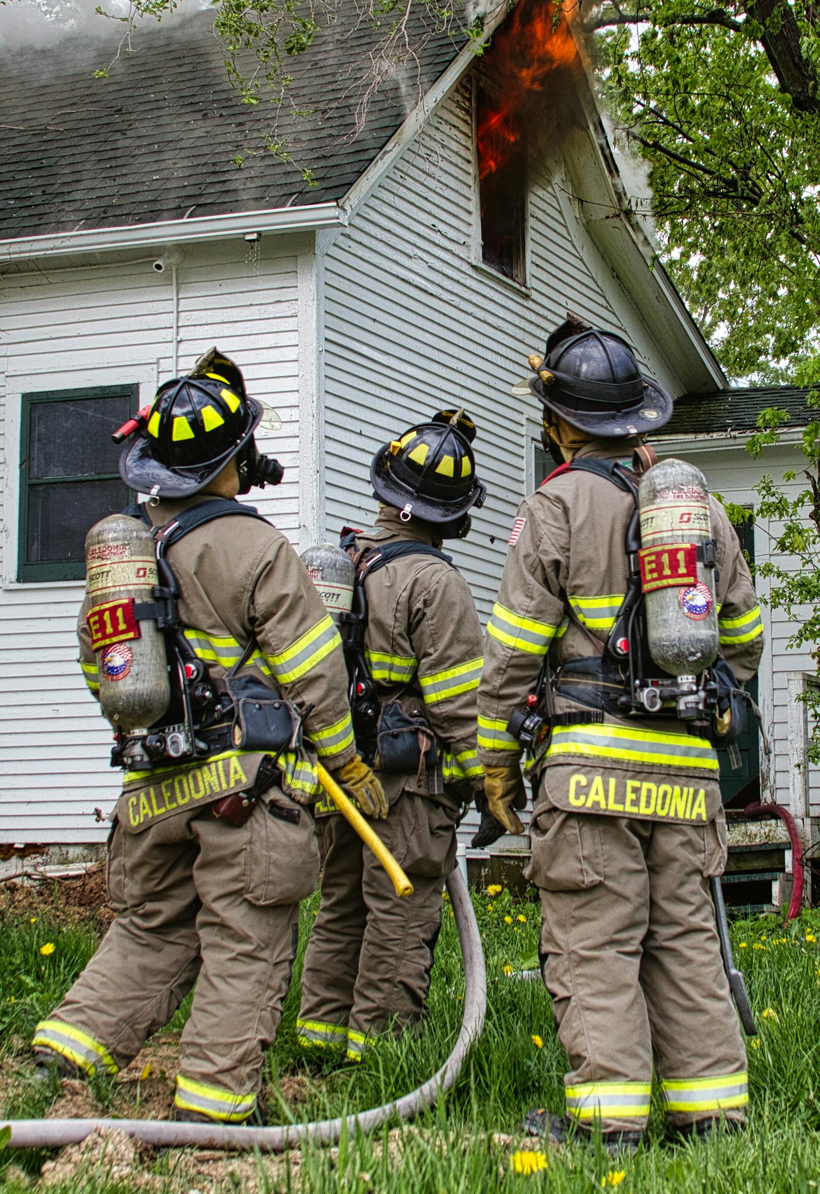 Team of firefighters at a residential house fire